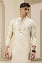 Raivat Ethnic Banarasi Art Silk Thread and Mirror Work Kurta Pajama In Beige Colour | Grocsy