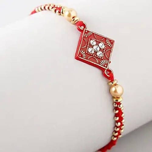 Sleek American Diamond Rakhi And Cashew Jar | Grocsy