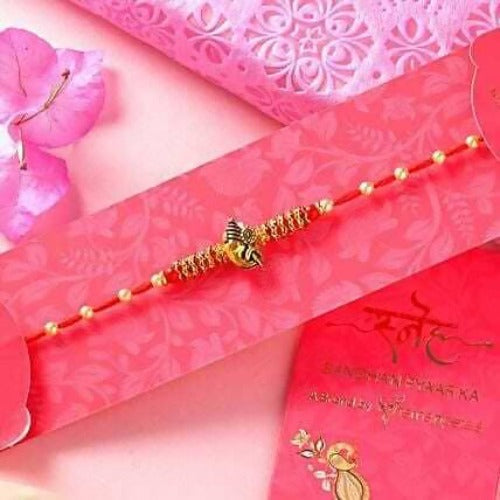 Ganesha Pearl Rakhi & Handmade Chocolate Truffle Combo | Grocsy