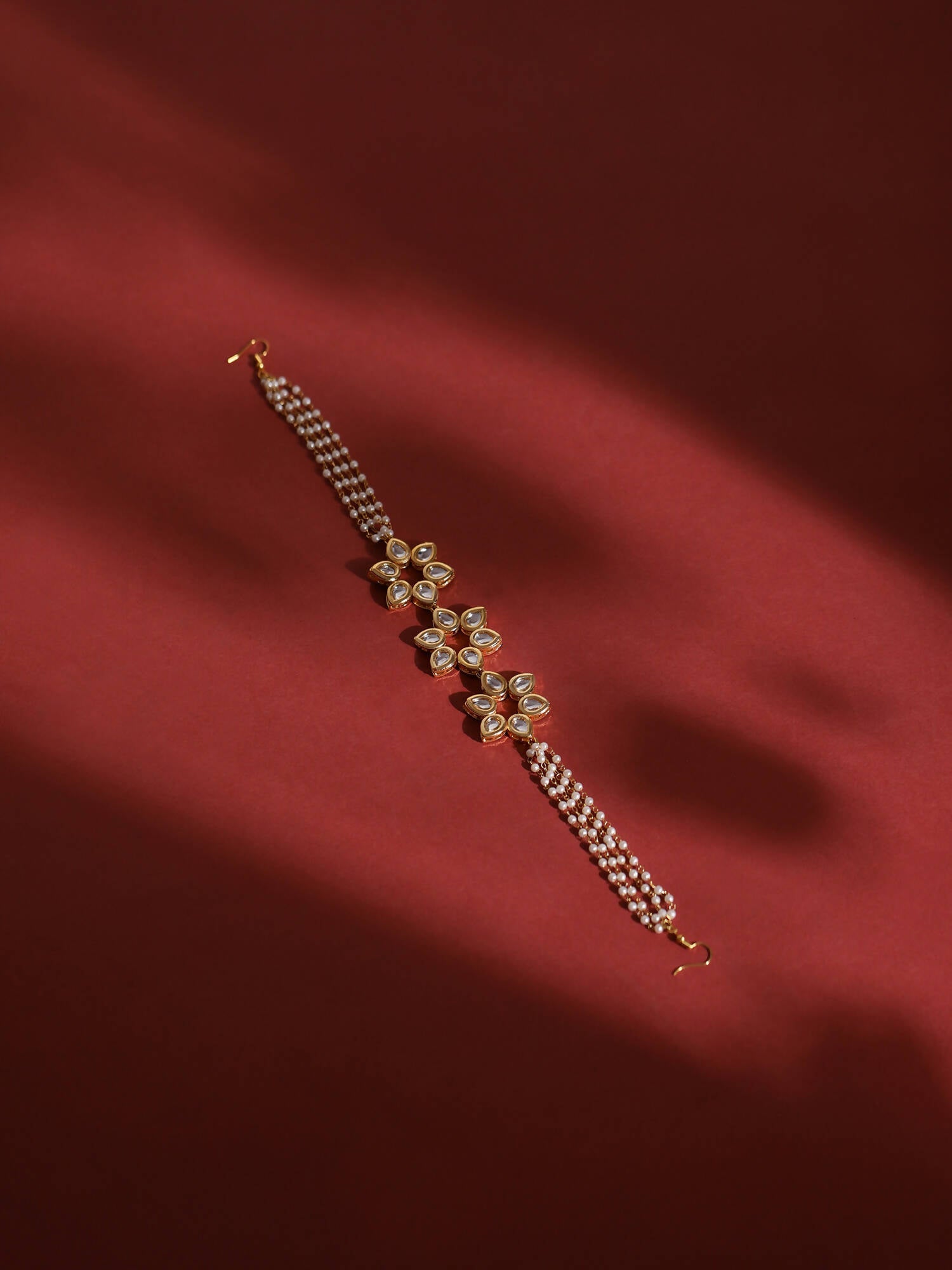 Gold-Polished White Kundan-Studded Pearl Beaded Hair Band - Ruby Raang | Grocsy
