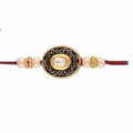 Gold-Polished Pearl and Stone Studded Rakhi | Grocsy