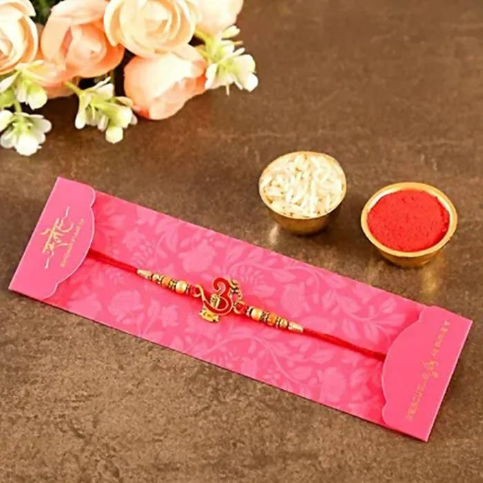 Auspicious Om Pearl Rakhi & Cashew Jar | Grocsy