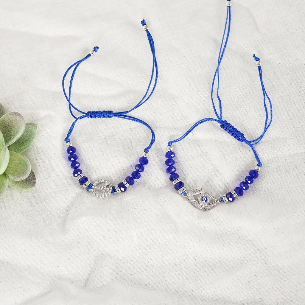NVR Women & Men Set of 2 Blue Evil Eye Rakhi With Roli Chawal | Grocsy