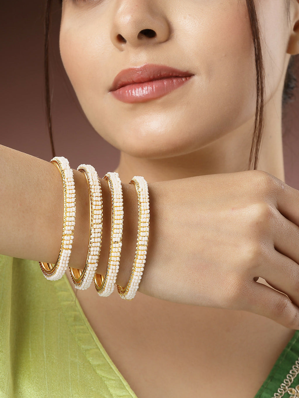 NVR Women's Set of 4 Gold-Polished Pearl Handcrafted Traditional Bangles | Grocsy