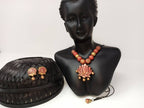Terracotta Lotus Pendant Necklace Set With Studs-Golden Pink | Grocsy