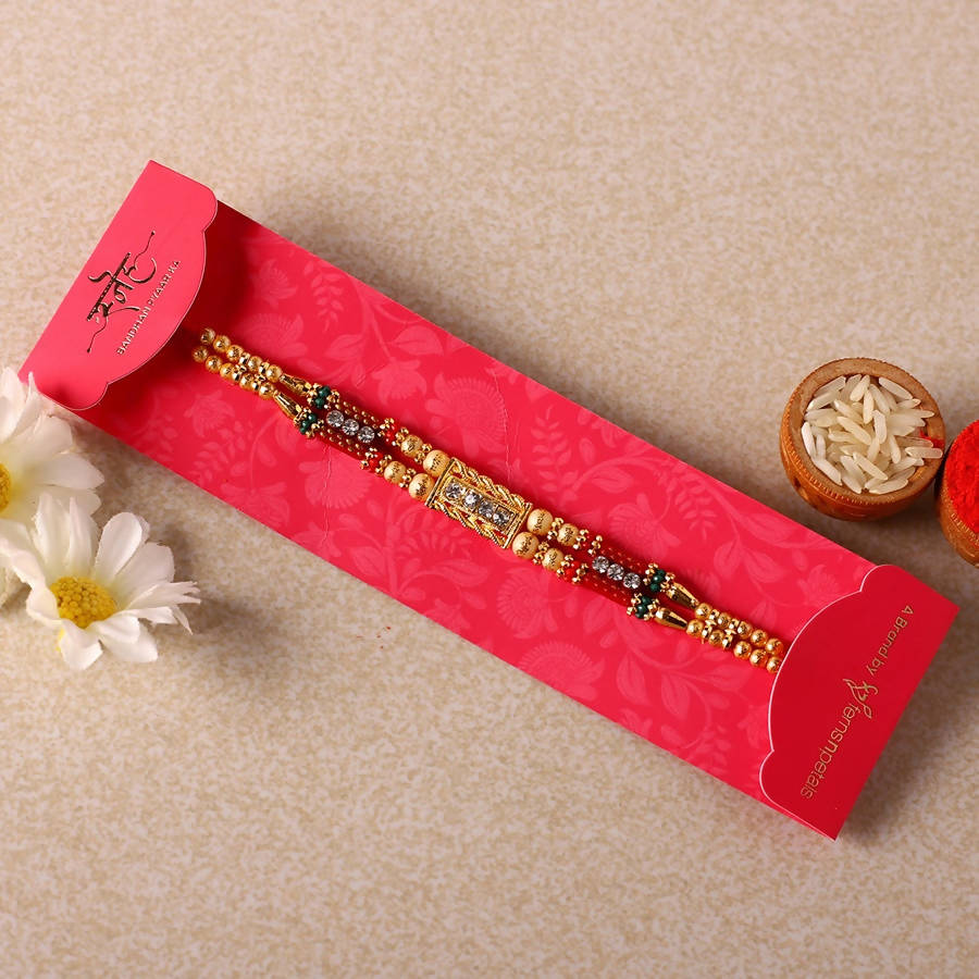 Dainty Kundan Rakhi And Kaju Rolls Box | Grocsy