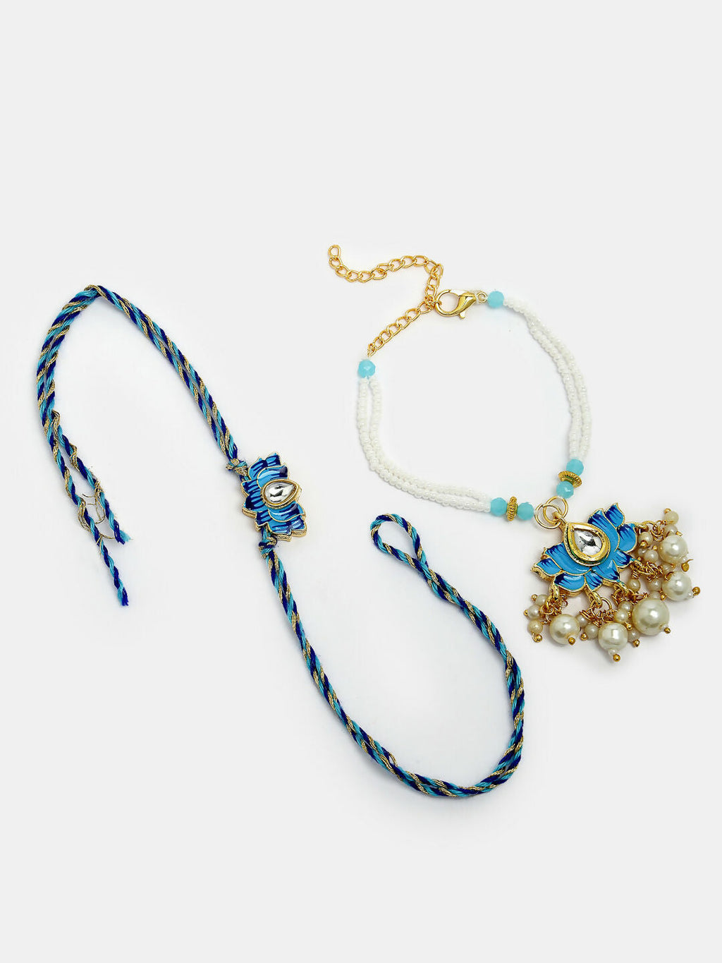 NVR Women & Men Set of 2 Blue Lotus Shape Kundan-Studded & Beaded Handcrafted Wraparound Rakhi Set With Roli Chawal | Grocsy