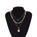 Gold-Polished Alloy Lock & Heart Multiple Chain Necklace - The Pari | Grocsy