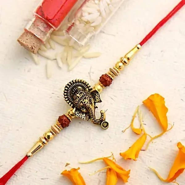 Lord Ganesha Rudraksha Rakhi & Almonds | Grocsy