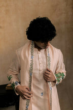 Falling Raw Silk Peach Gajavana Kurta Set By Hilo Design | Grocsy