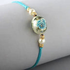 Rose Japanese Stone Rakhi & Silk Chocolates | Grocsy