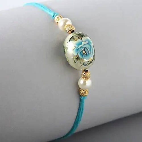 Rose Japanese Stone Rakhi & Silk Chocolates | Grocsy