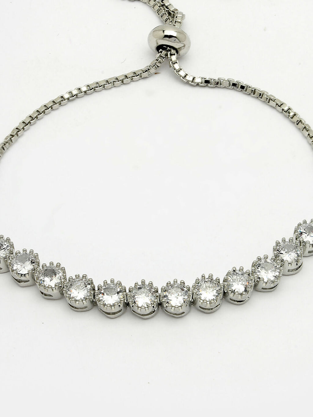 NVR Women Silver-Plated American Diamond Studded Rakhi With Roli Chawal | Grocsy