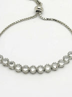 NVR Women Silver-Plated American Diamond Studded Rakhi With Roli Chawal | Grocsy