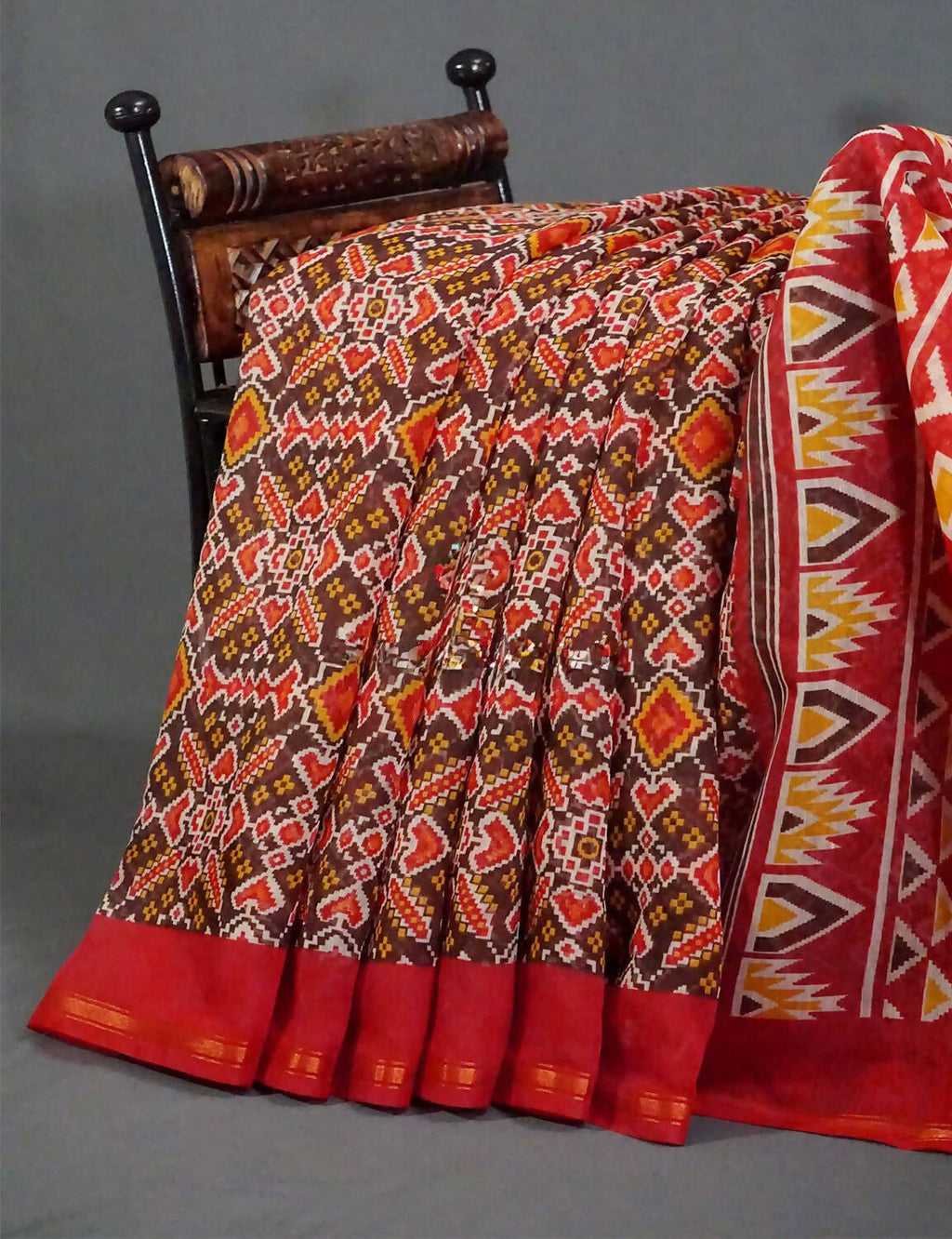Brown And Red Coloured Patola Print Semi Chanderi Saree By Gayathri Reddy Designer Studio | Grocsy