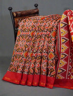 Brown And Red Coloured Patola Print Semi Chanderi Saree By Gayathri Reddy Designer Studio | Grocsy