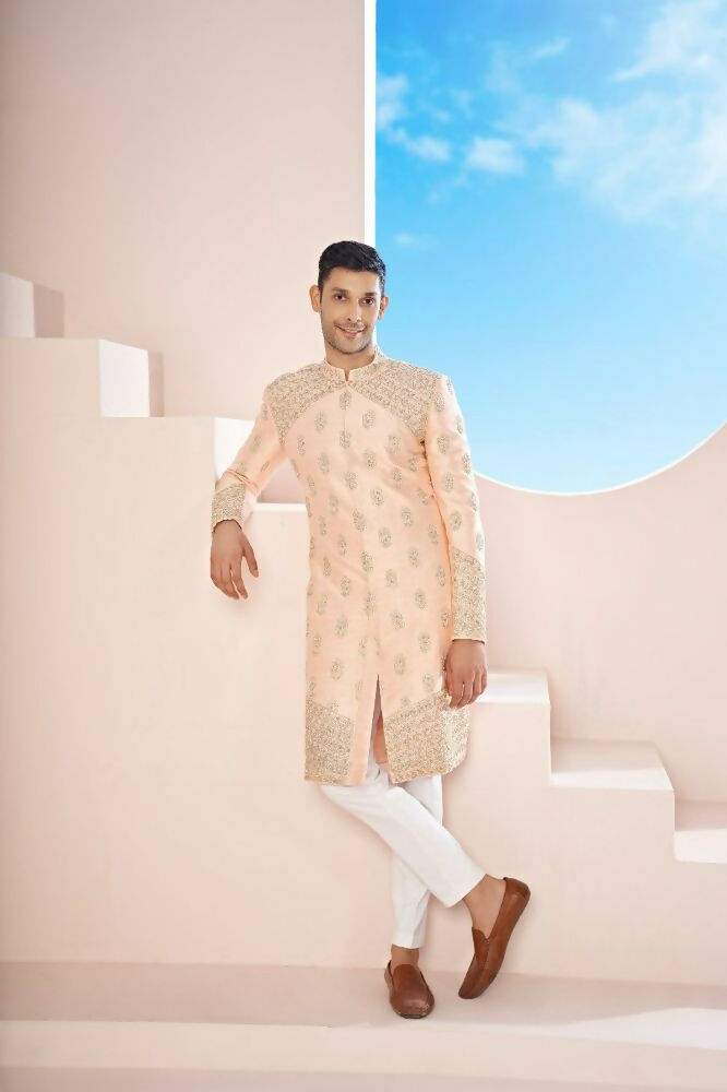 The Peach Sherwani Features Hexagonal Butas , V-Shaped Floral Jal Borders by Hilo Design | Grocsy