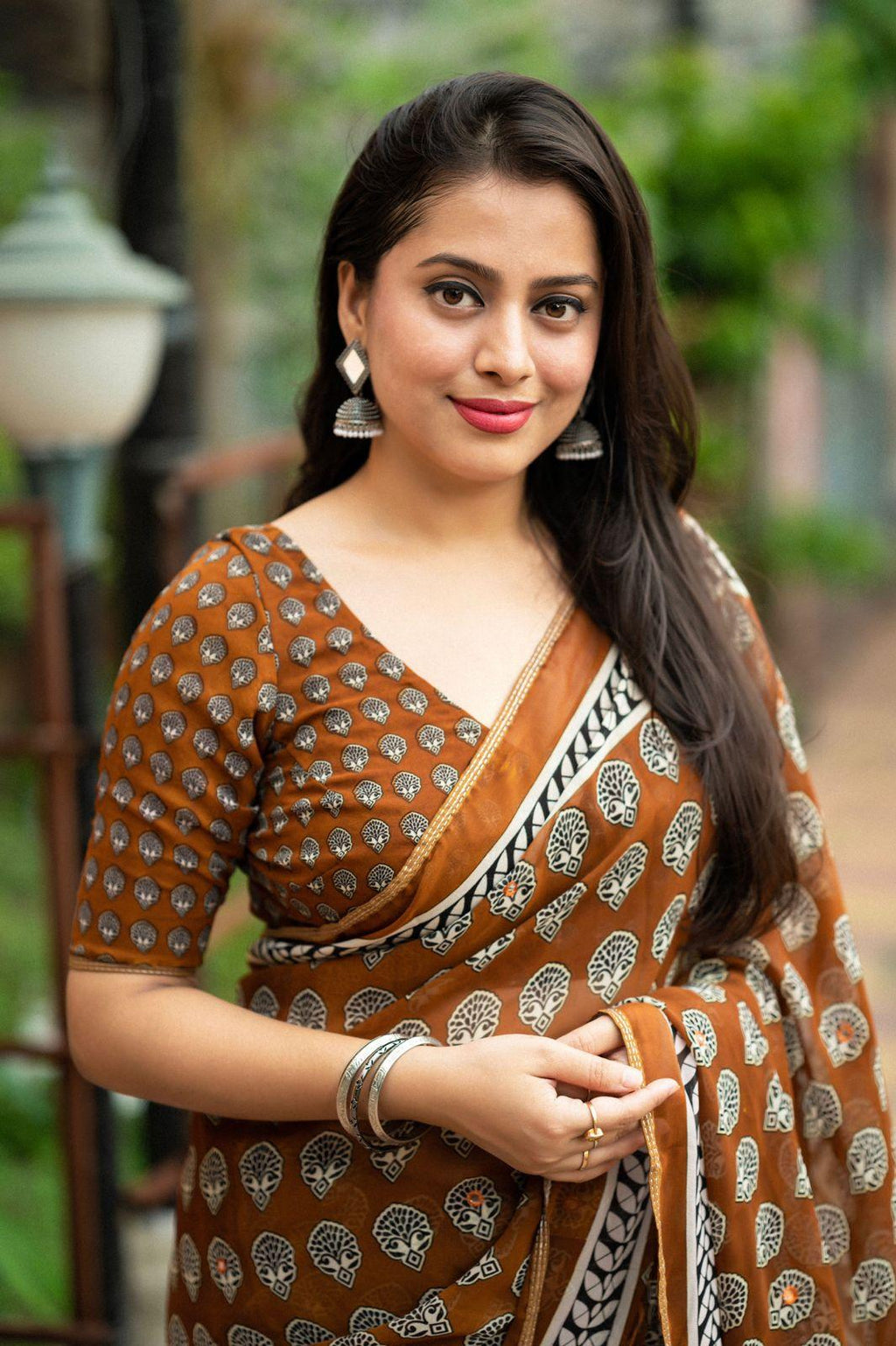 Mustard Poly Georgette Ajrak Saree with Unstitched Blouse - A2M | Grocsy