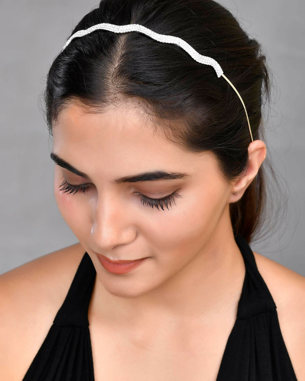 VOJ Silver Plated AD Studded Wave Shaped Hairband | Grocsy