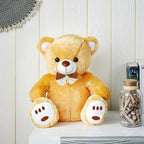 Webby Plush Cute Sitting Teddy Bear Soft Toys With Neck Bow (Brown Color) | Grocsy