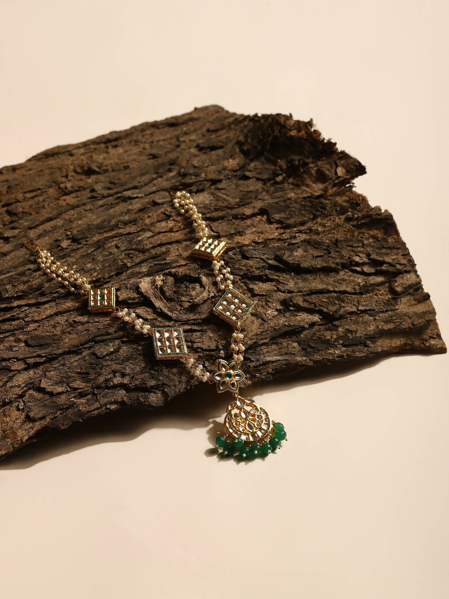 Gold-Polished White Green Kundan-Studded Pearl Beaded Matha Patti - Ruby Raang | Grocsy