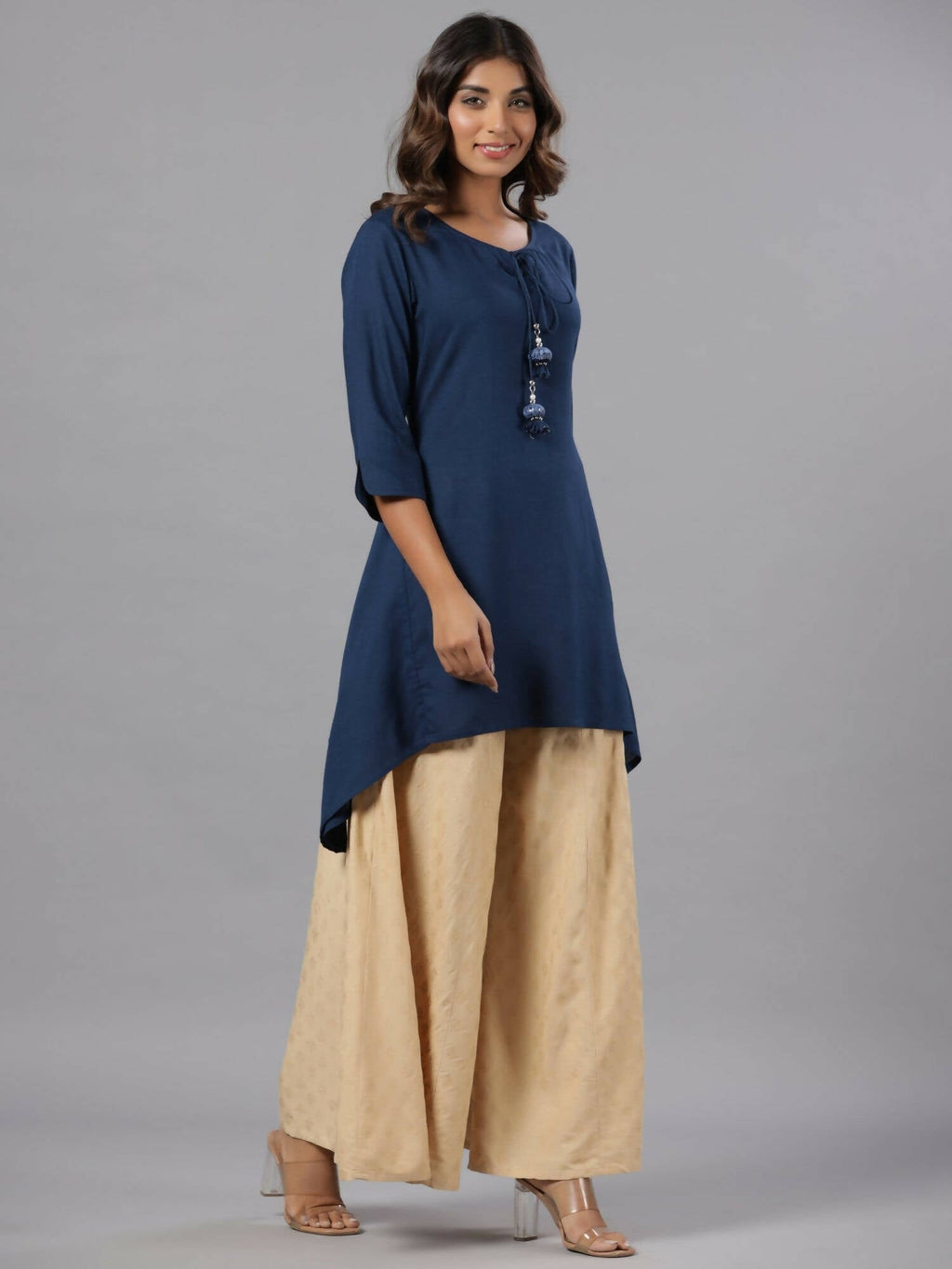 Juniper Women Indigo Rayon Solid Asymmetric Kurta | Grocsy