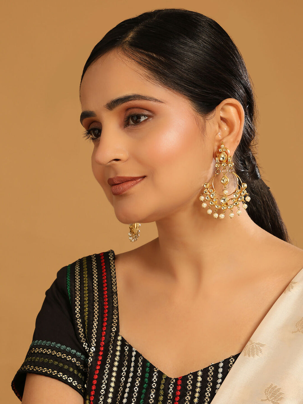 Nuyug 22K Gold Plated Kundan Studded Contemporary Shaped Pearl Drop Chandbalis | Grocsy