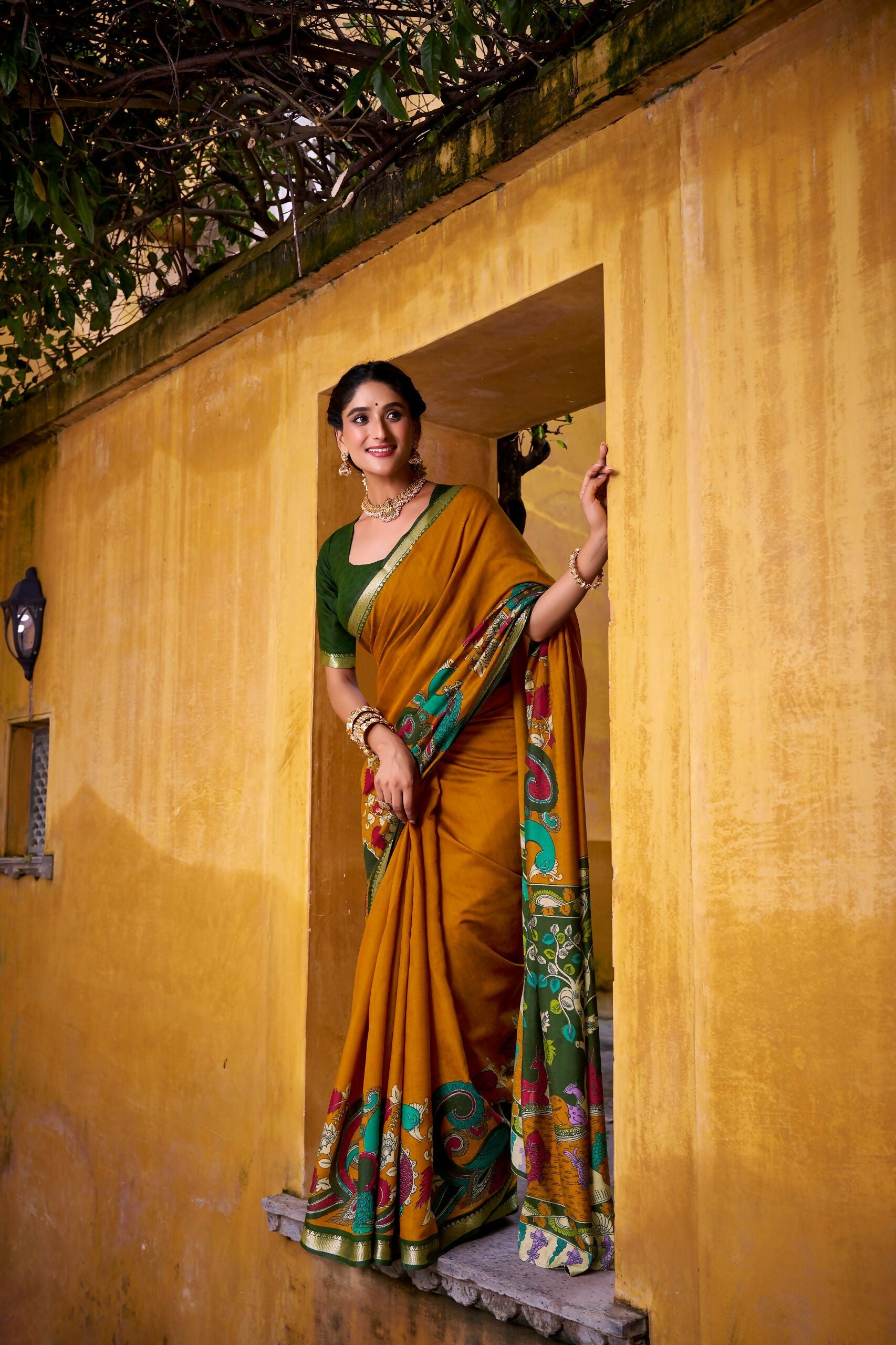 Vastranavya Mustard Viscose Chanderi Kalamkari Print with Zari Working Saree & Unstitched Blouse | Grocsy