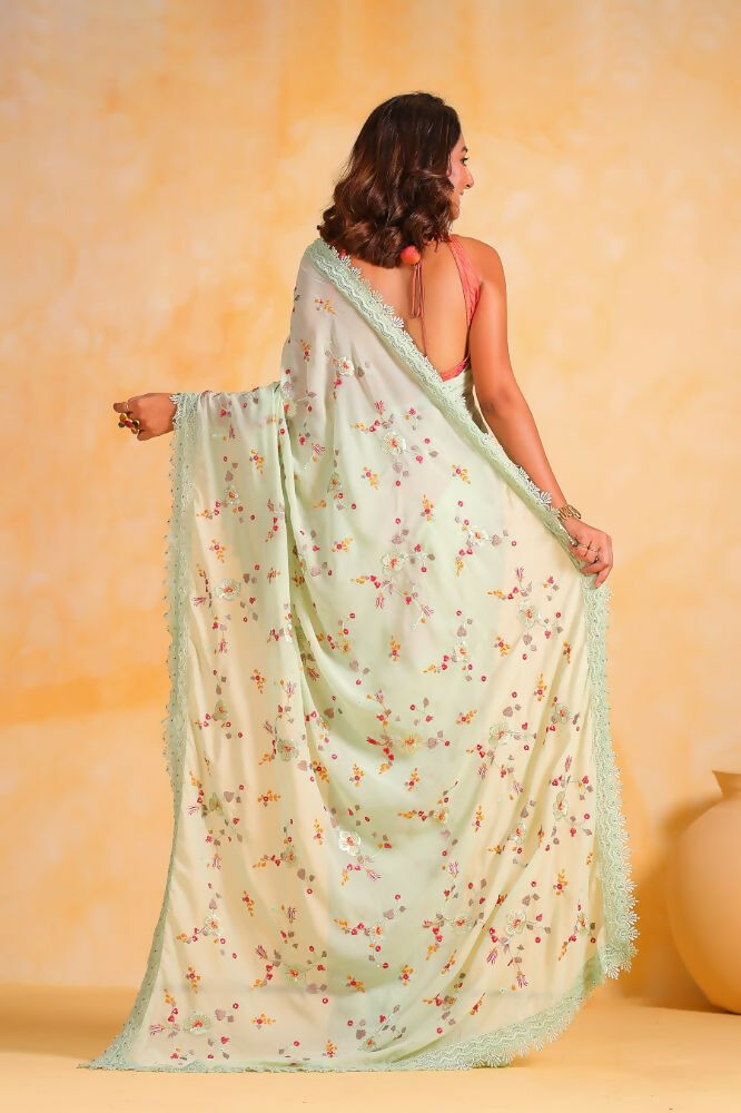 Vamsee Riva Pista Georgette Saree | Grocsy