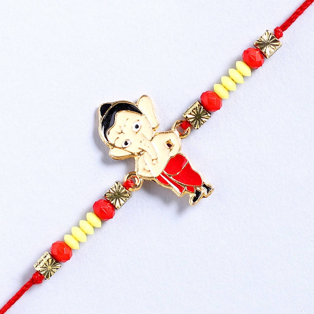 Cute Ganesha Rakhi & Kaju Rolls Box | Grocsy