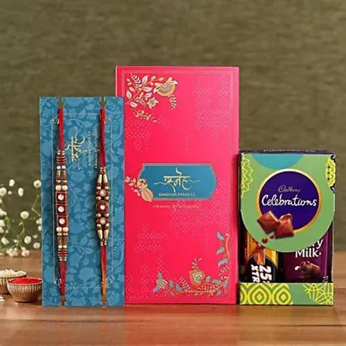 2 Stone Work Rakhis and Cadbury Celebrations Box | Grocsy