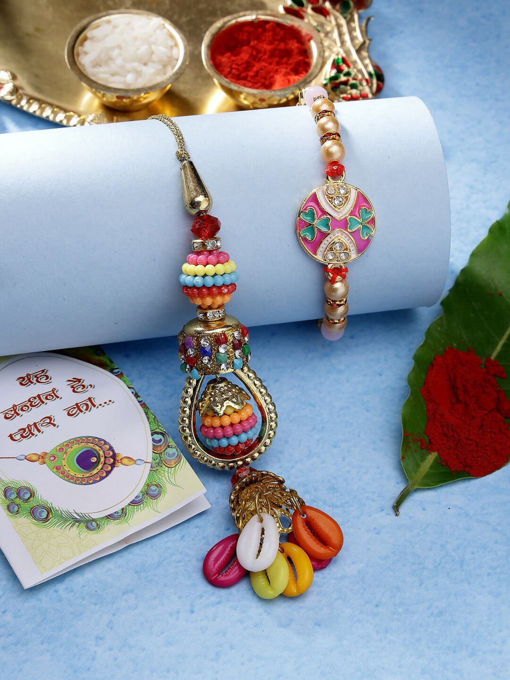 NVR Women & Men Set of 2 Multicolor Artificial beads Bhaiya Bhabhi Rakhi With Roli Chawal & Chocolate | Grocsy
