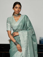 Shree Shyam Fashion Elegant Sea Green Woven Linen Saree with Contrast Zari Border & Tassels - Soft & Breathable Party Wear | Grocsy
