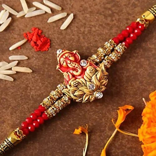 Ganesha Sacred Rakhi & Kaju Rolls Box | Grocsy