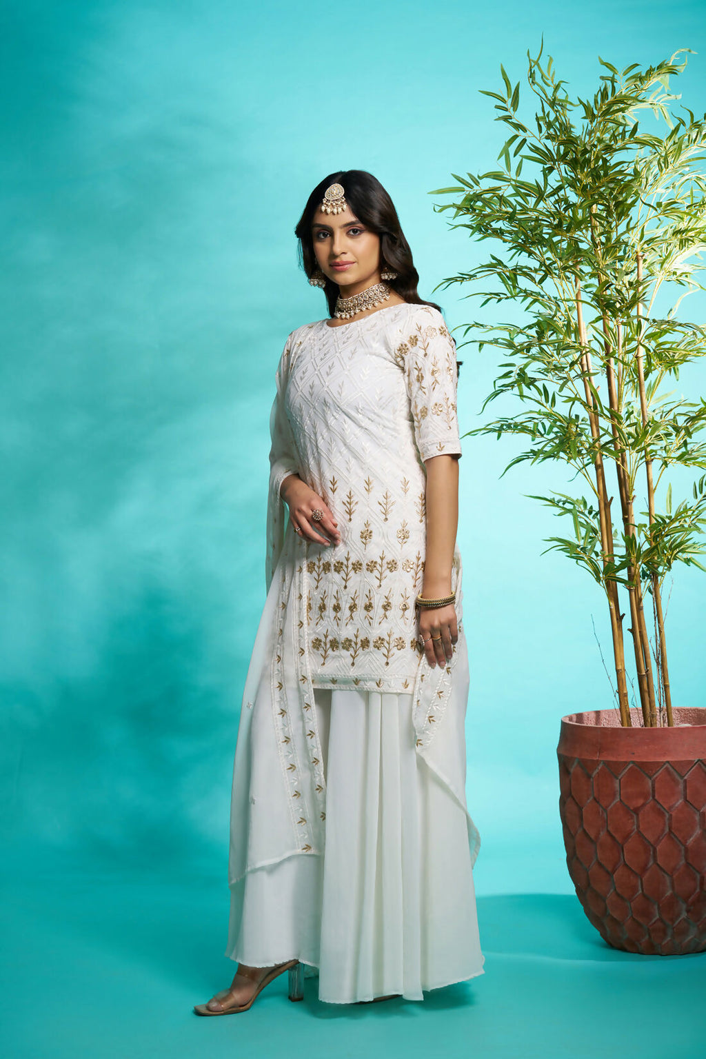 Aayaa Designer Faux Gorgette Embroidery Zari Sequins Thread work Full Flaired plazzo Suit with Dupatta - Off White | Grocsy