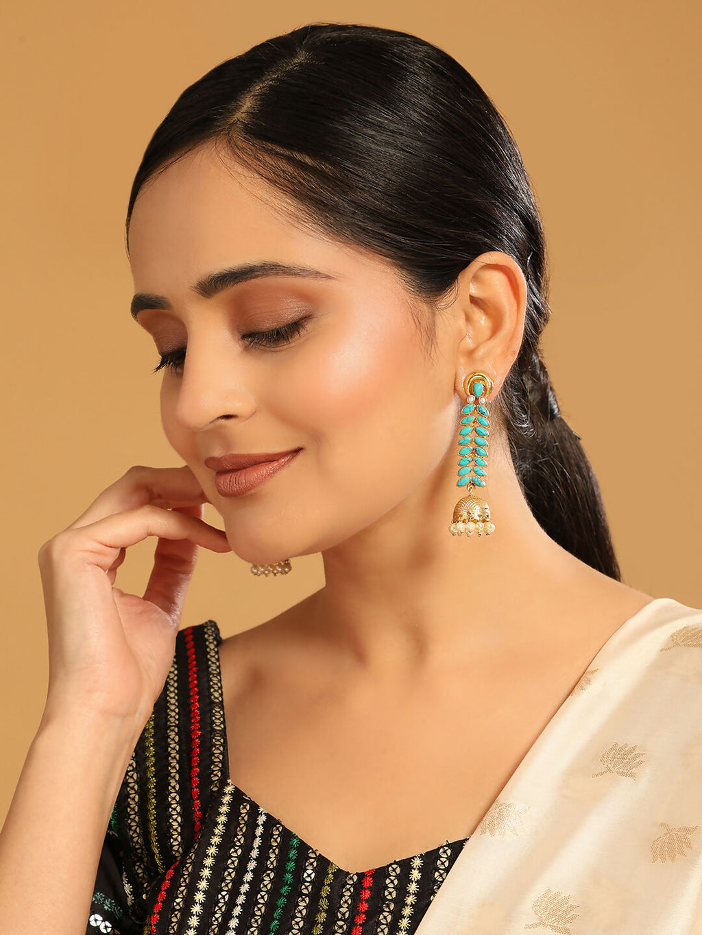 Nuyug 22K Gold Plated Pearl & Turquoise Stone Studded Contemporary Shaped Jhumkas | Grocsy