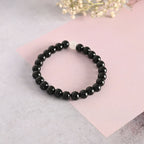NVR Men & Women Black Marble Crystal Beaded Elasticated Bracelet | Grocsy