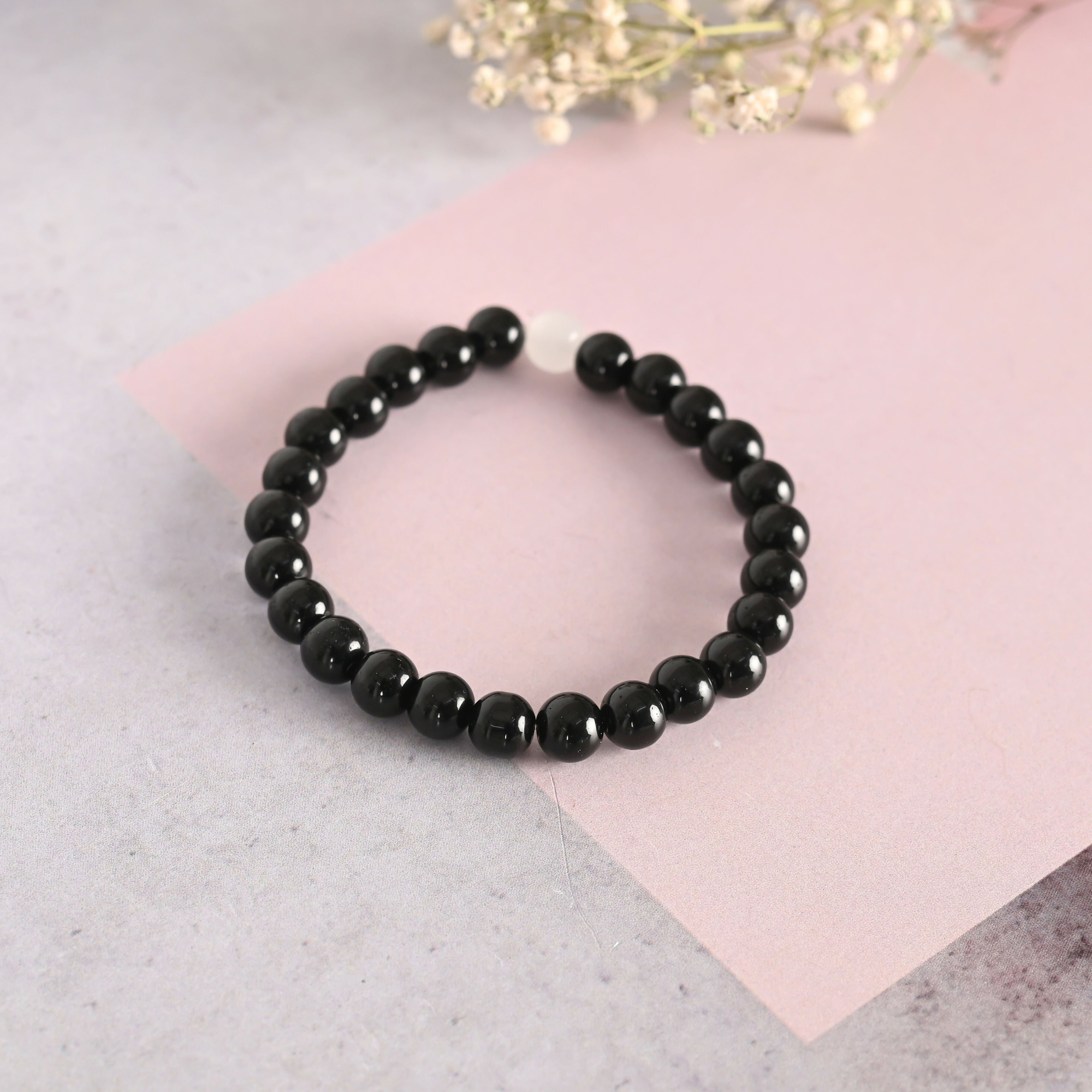 NVR Men & Women Black Marble Crystal Beaded Elasticated Bracelet | Grocsy