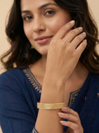 NVR Women Set of 4 Gold Plated Handcrafted CZ Studded Bangle | Grocsy
