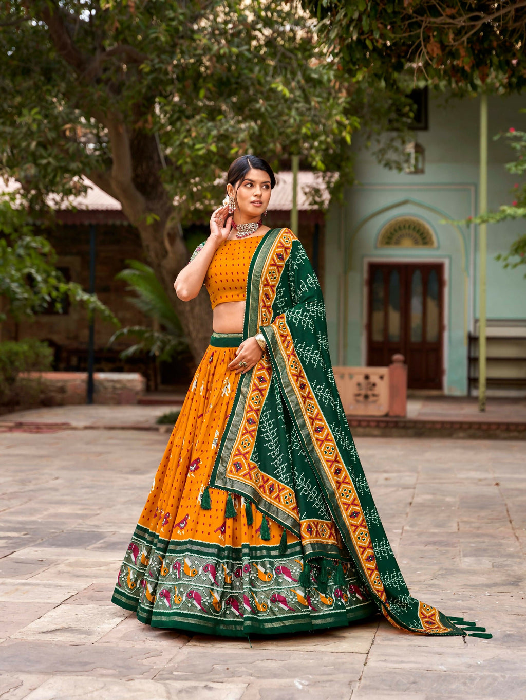 Vastranavya Patola Printed and Foil Work Tussar Silk Lehenga with Unstitched Blouse - Mustard | Grocsy