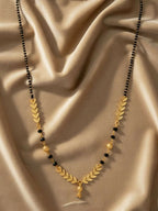 NVR Women Gold Plated Black Beaded Short Design Mangalsutra | Grocsy