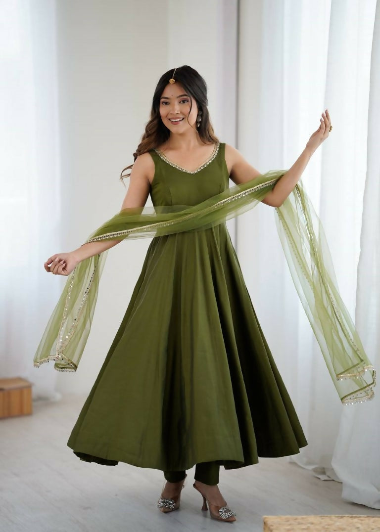 Teeya Creation Green Color Pure Roman Silk Mirror Lace Party Wear Gown | Grocsy