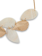Gold-Polished Alloy Shell And Brass Leaf Statement Necklace - The Pari | Grocsy