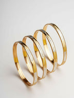 NVR Women Set of 4 Gold Plated CZ Toned Bangle | Grocsy