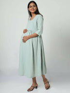 Manet Three Fourth Maternity Dress Striped With Concealed Zipper Nursing Access - Pista Green | Grocsy